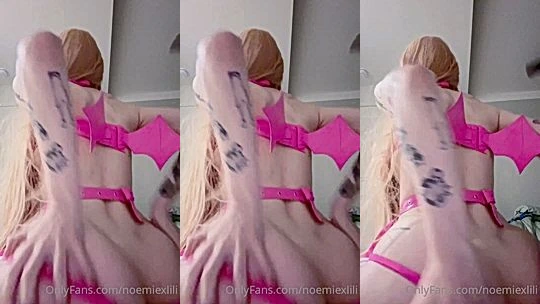 Noemiexlili teasing in her pink latex lingerie