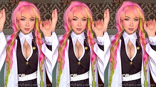 Dessyyc teasing her big tits in her demon slayer cosplay