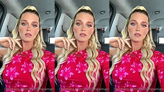 Alysha Newman showing off her pink dress in the car