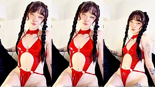Mia Yokai playing with her pussy wearing red latex lingerie