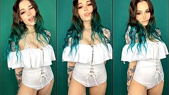 Kayla Erin squeezing her big tits in her white dress