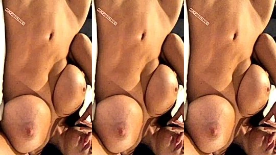 Genesis Mia Lopez teasing her naked big tits in the bathroom mirror