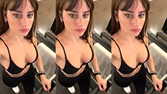 Merisiel Irum teaing her perky tits in black lingerie