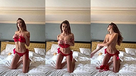 Liza Kovalenko teasing her sexy red lingerie in the bedroom