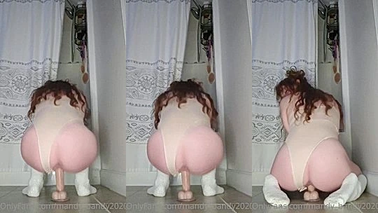 MandyFrizzle riding a dildo in her white bodysuit