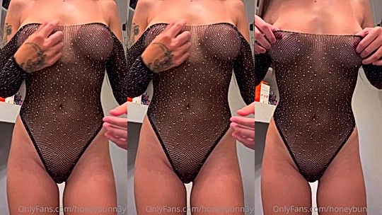 Kaitviolet teasing her perky tits in fishnet bodysuit