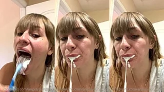 Angel Youngs brushing her teeth and teasing her tongue