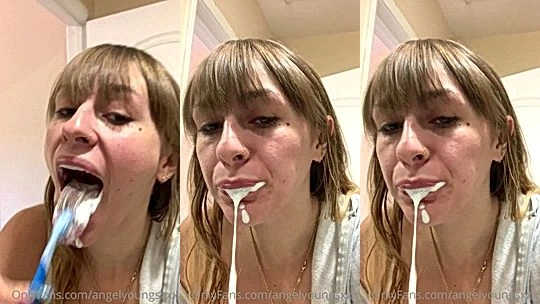 Angel Youngs brushing her teeth and teasing her tongue