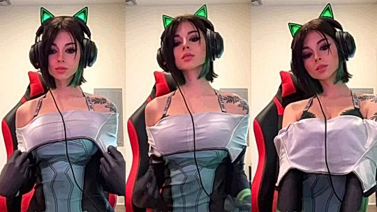 Noemiexlili teasing her big tits in cosplay bodysuit