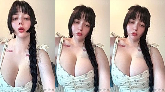 Alina Becker teasing her big tits in white bodysuit