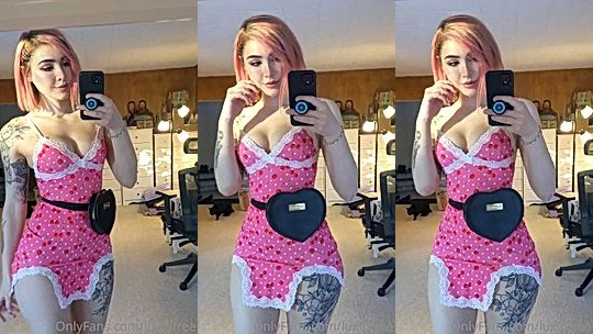 Luxlo teasing her sexy tight skirt in the mirror