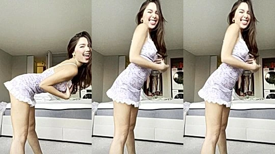 Kailey Mae teasing her mini skirt in the laundry room