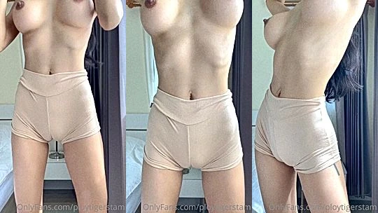 Ploytigerstam teasing her naked body in tight bodysuit
