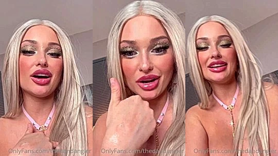 Thedandangler teasing her naked big tits for the camera