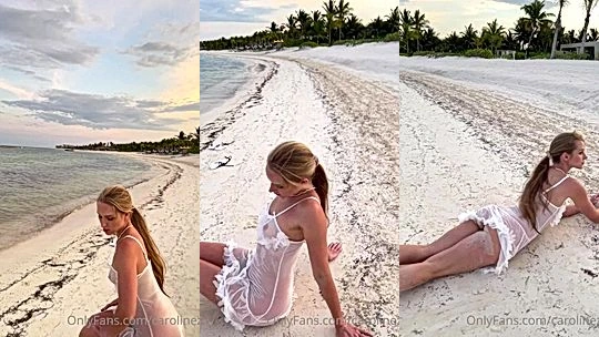 Caroline Zalog evening teasing her see-through gown by the beach