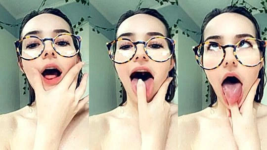 OMGCosplay playing with her tongue and saliva
