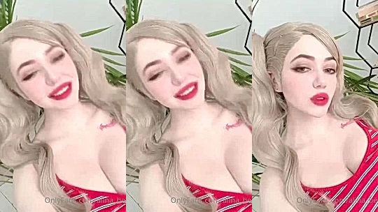 sexy girl Alina Becker teasing her big tits in her red suit
