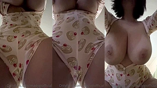 Mady Gio teasing her big tits bottom view