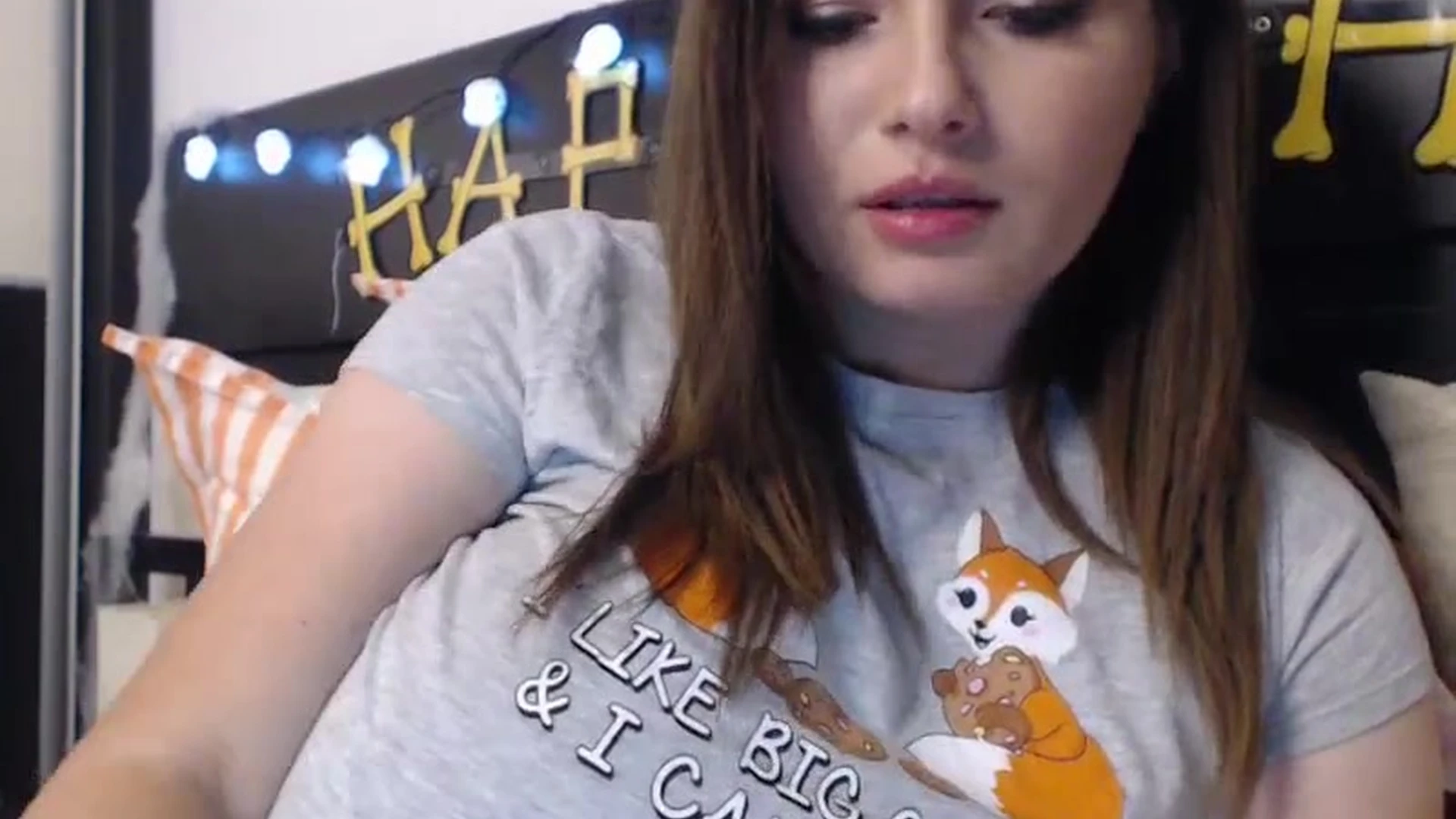 Busty Ema flashing her big tits in her red top