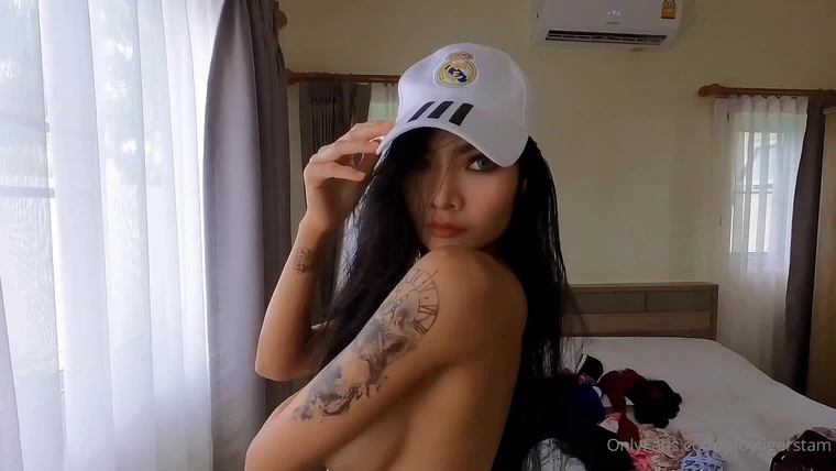 Ploytigerstam teasing her naked perky tits wearing hat
