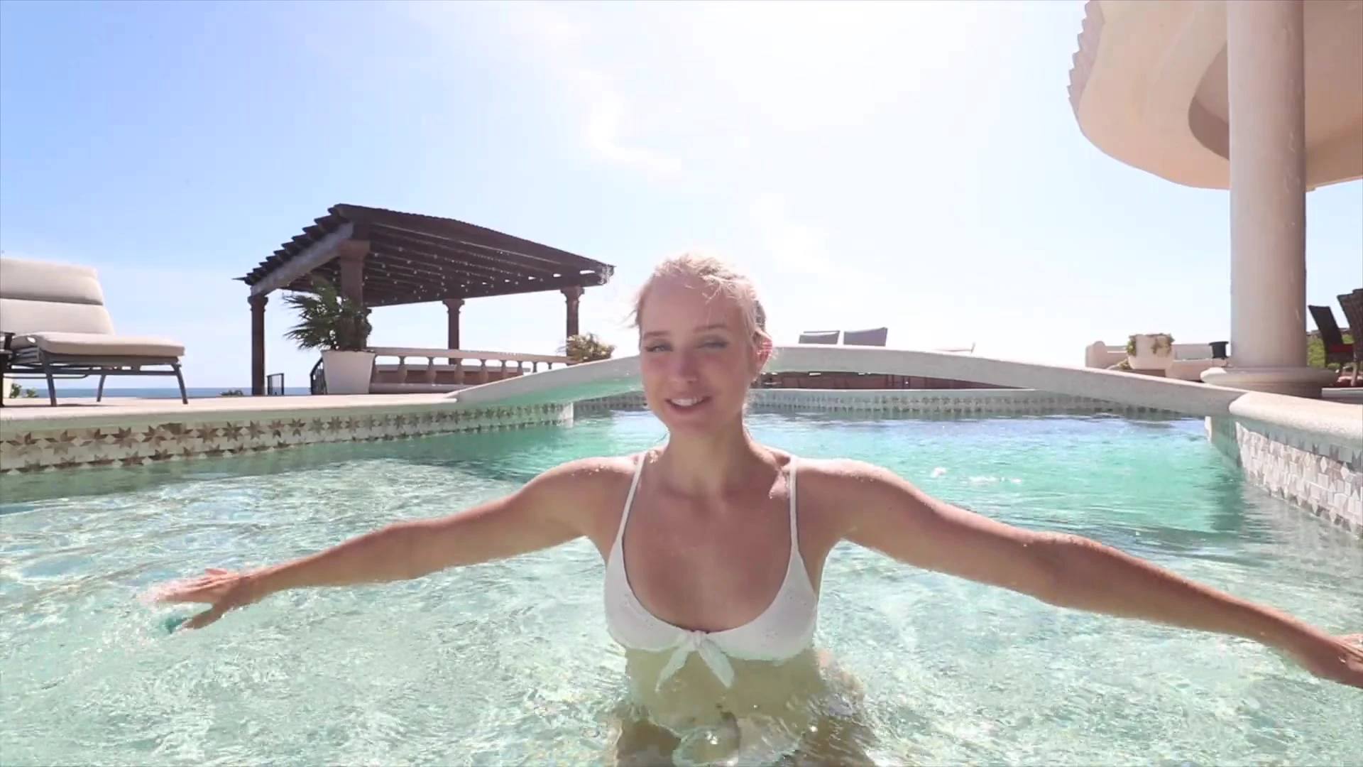 Caroline Zalog teasing her new white bikini in the pool