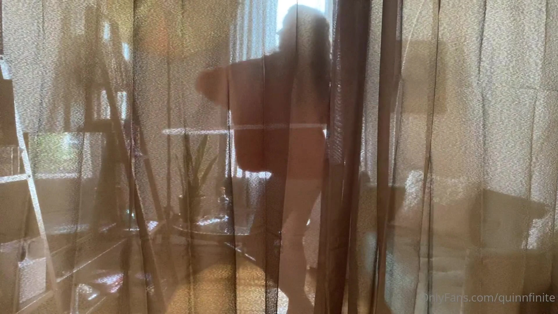 QuinnFinite teasing her naked body through a veil