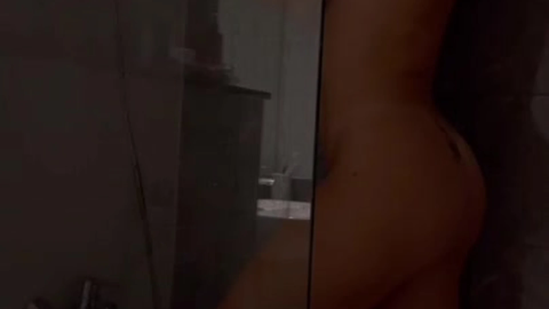 Darja Sobakinskaja teasing her big ass behind a mirror