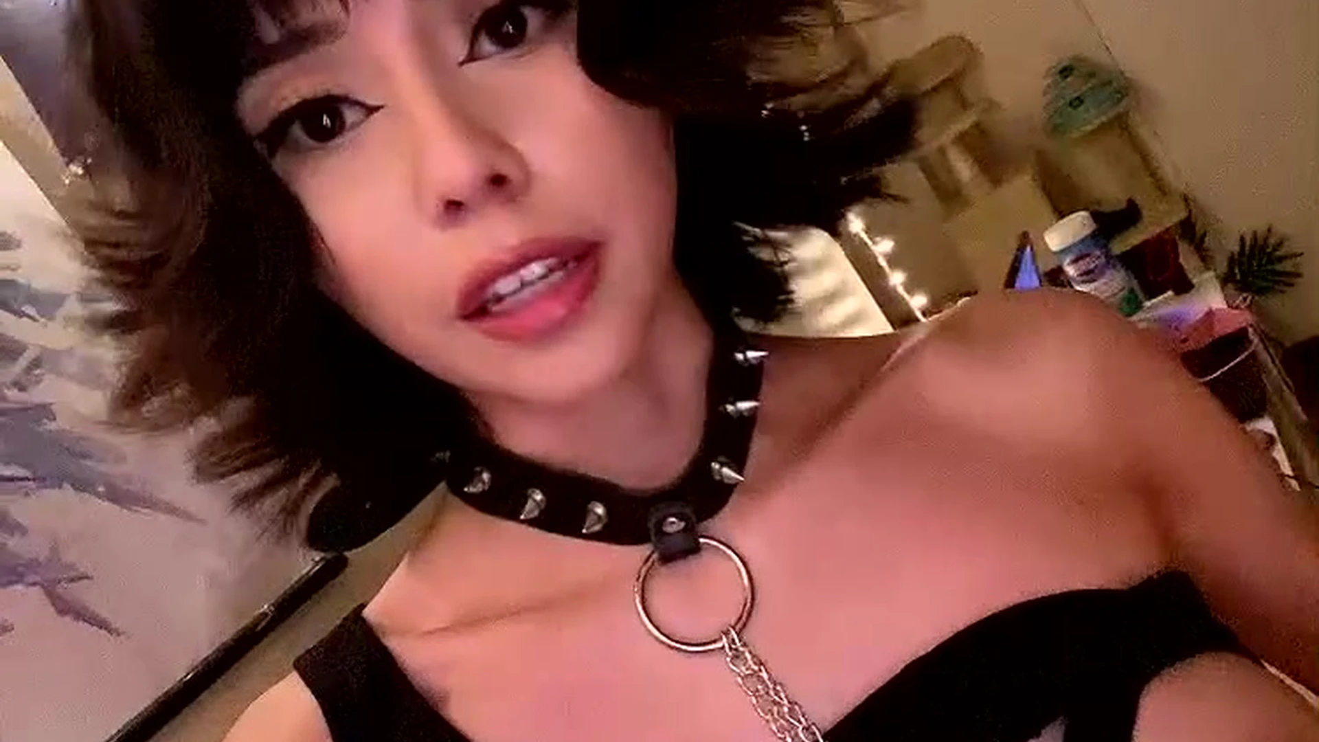 Nekob0icarti teasing her goth girl outfit
