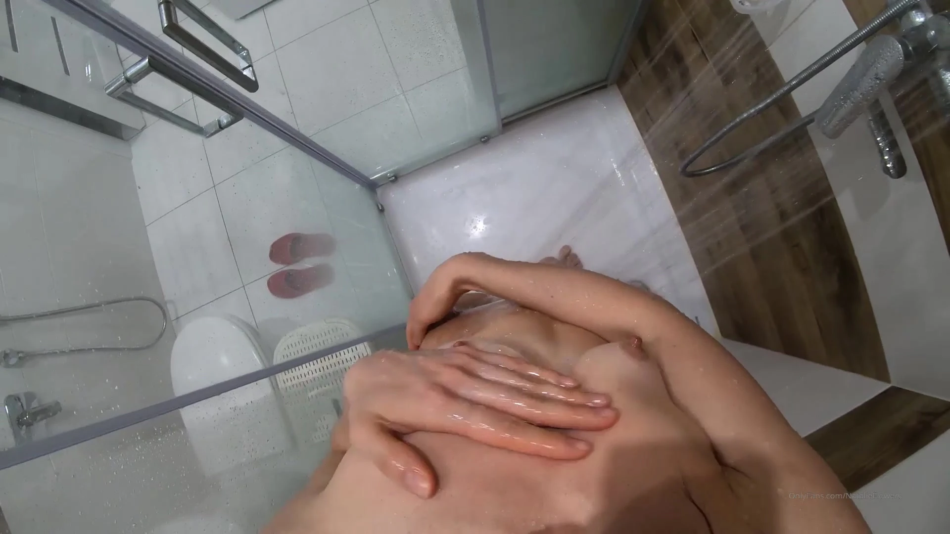 Natalie Flowers washing her small tits in the shower