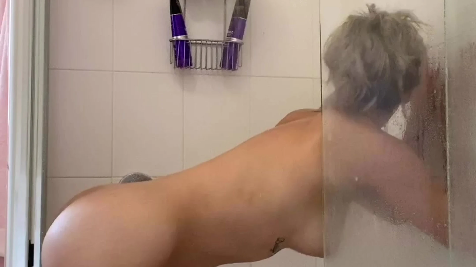 Bree Louise fucking a wall dildo in the shower