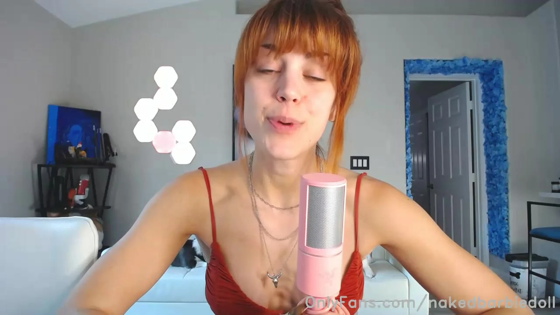 Molly Stewart teasing her big tits in her red bra