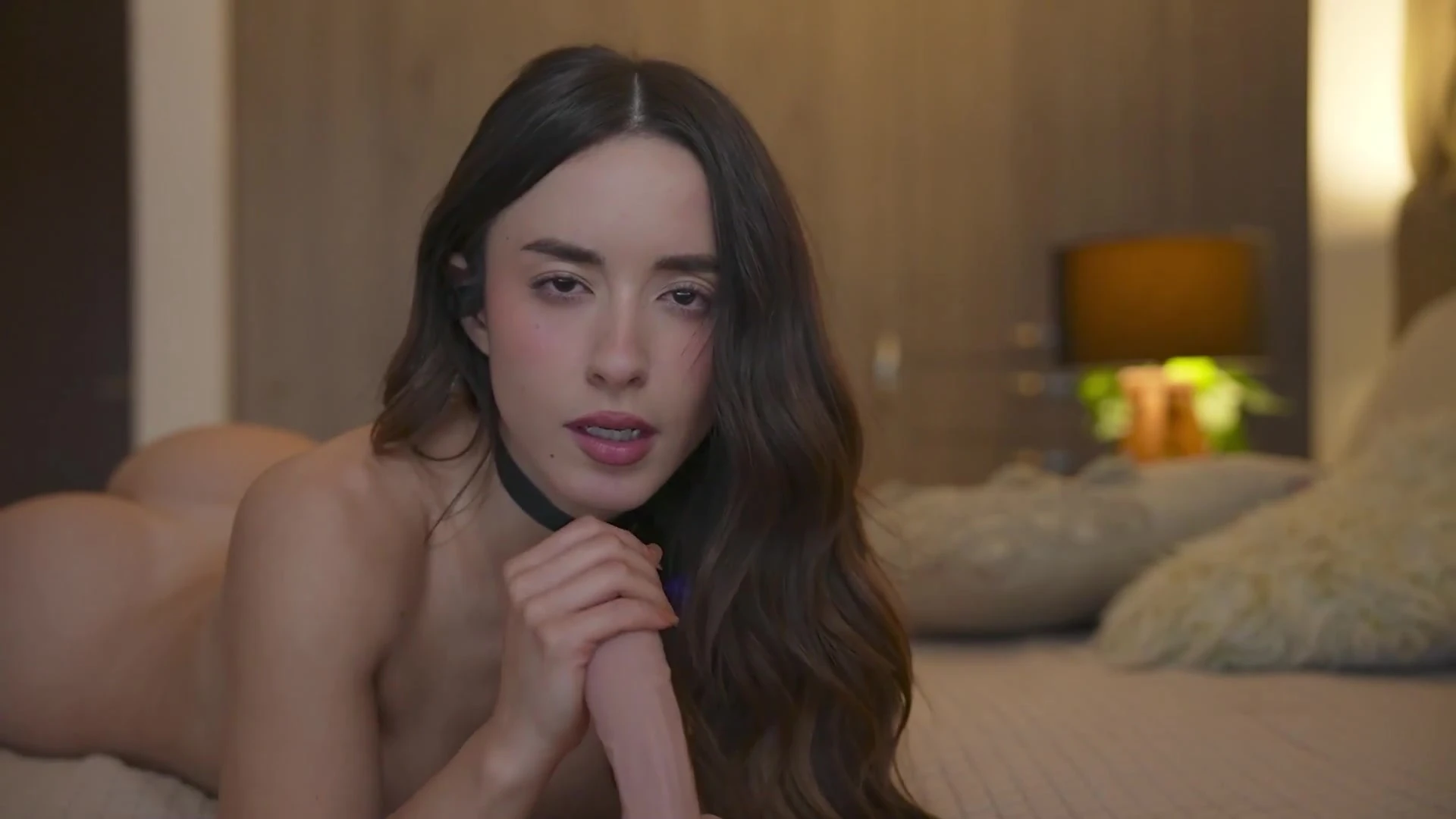 Eimigirl hand jerking a big white dildo
