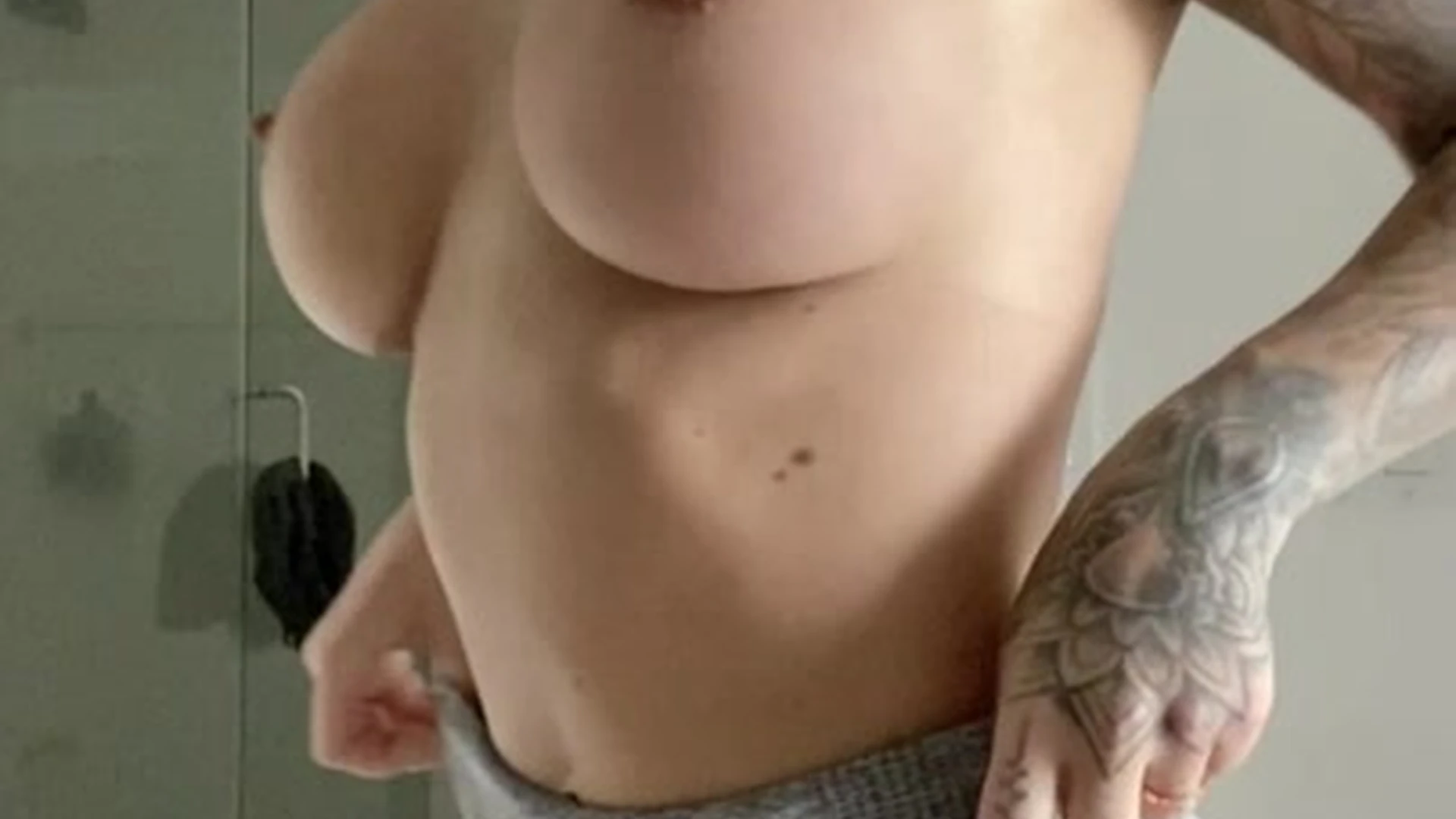 Kayla Lauren teasing her naked perky tits in the bathroom