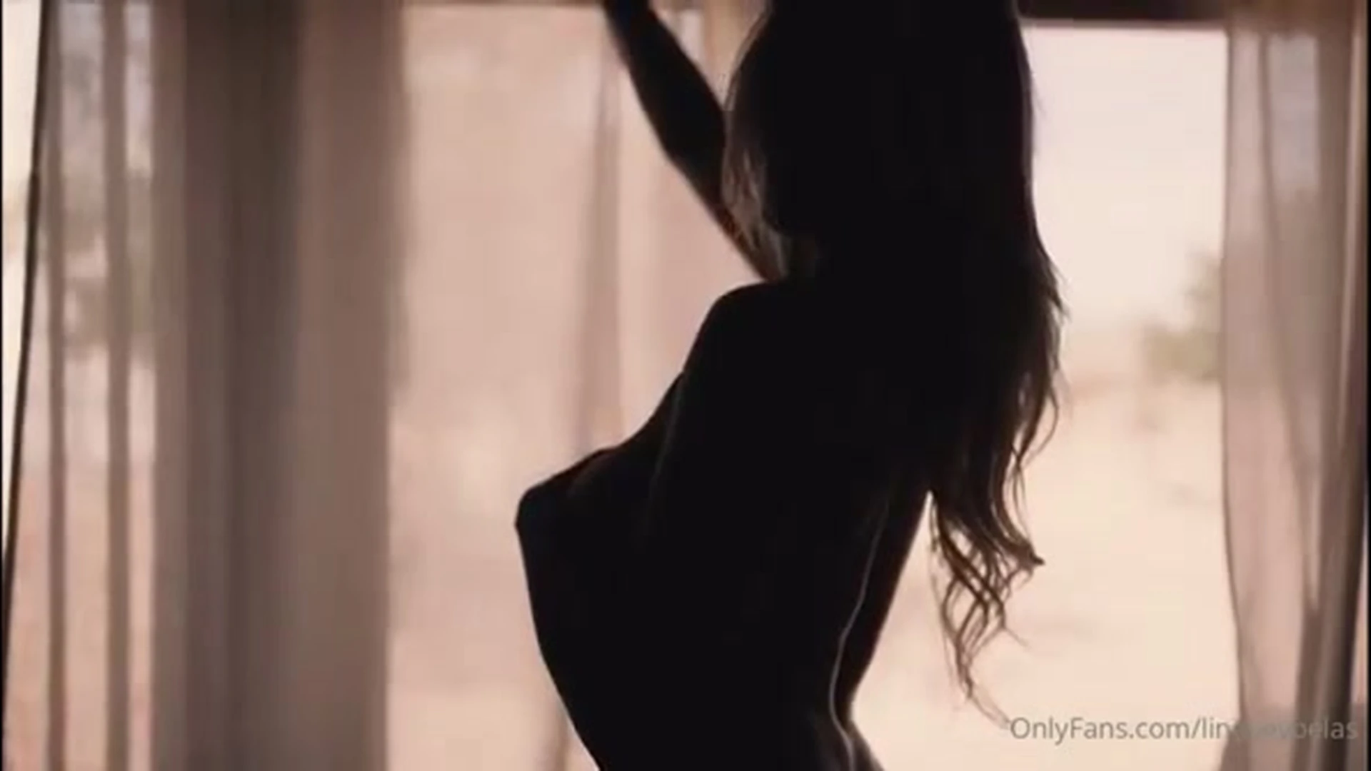 Lindsey Pelas showing off her naked body by the window