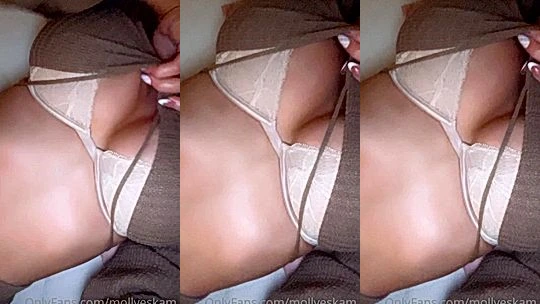 Molly Eskam teasing her big tits in her sexy bra