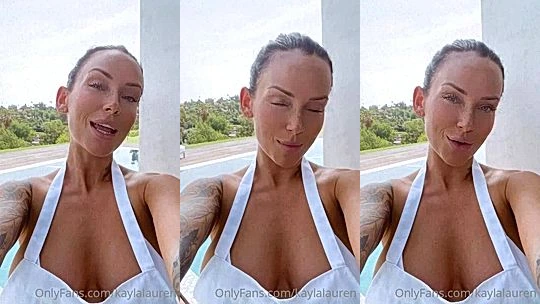 Kayla Lauren showing off her big tits on the balcony