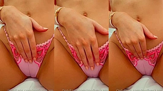 Molly Eskam playing with her pussy in pink lingerie