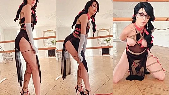 Lera Himera showing off her sexy black dress whiletied up in rope