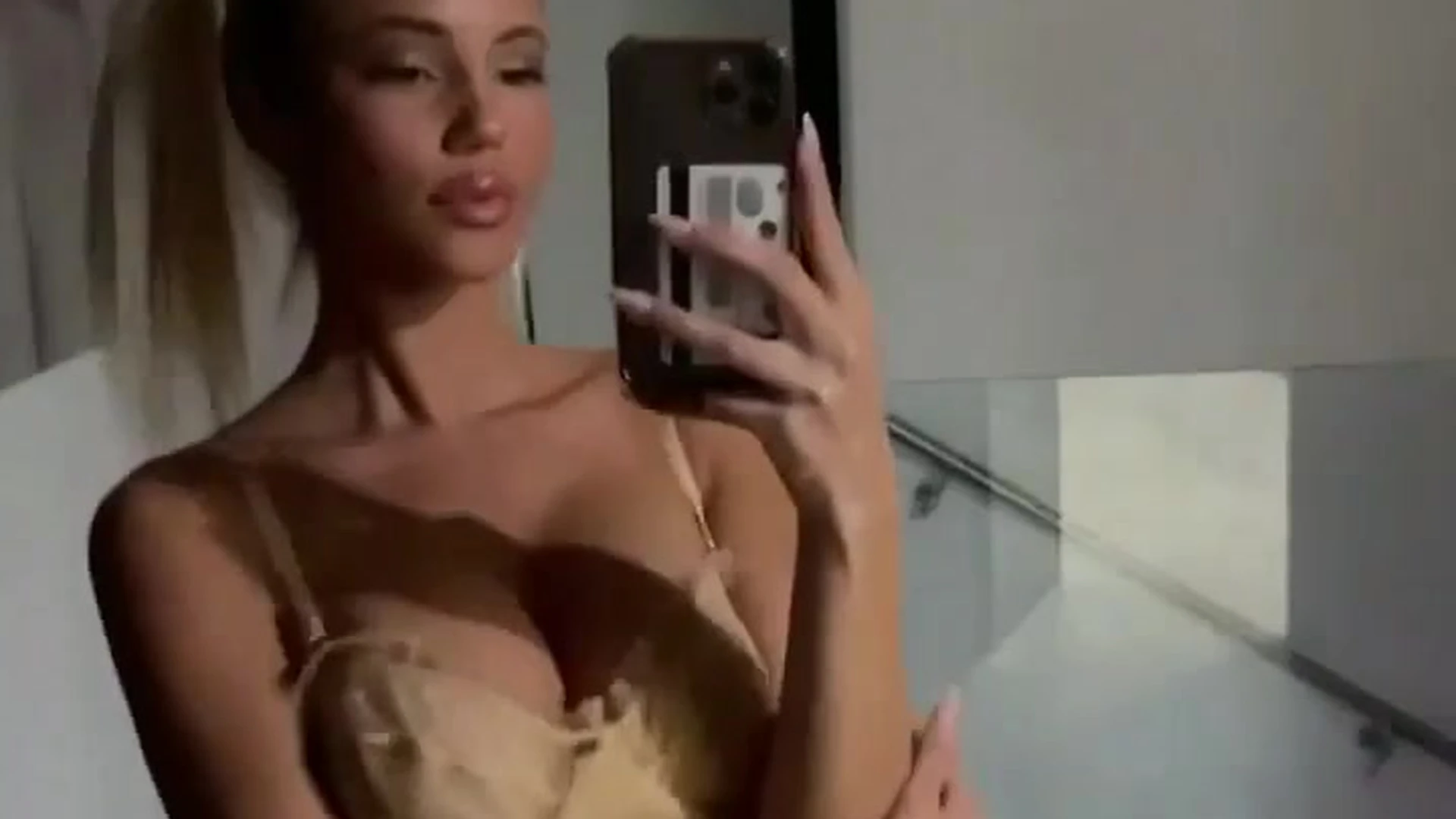 Kt Lordahl teasing her big tits in yellow lingerie