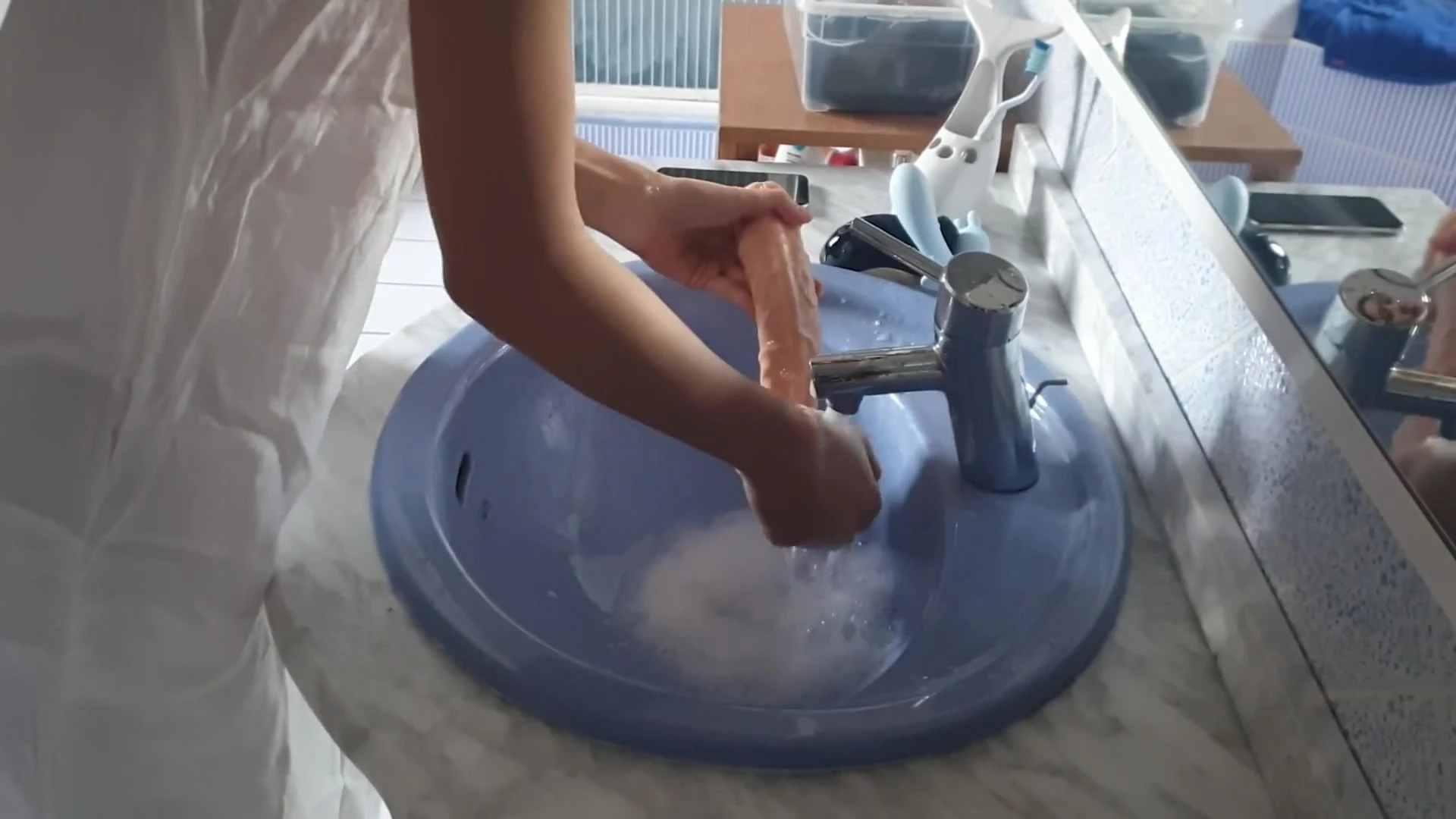 June Liu cleaning up her sex toys and using it later